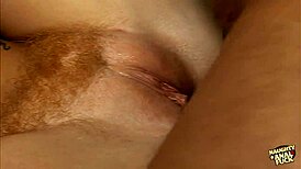after double penetration, this redhead gets a bukkake over her face, wow!
