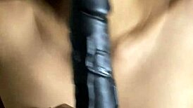 Horny stepsister uses big black dildo for masturbation