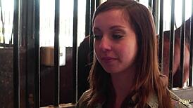 Lesbian Brunettes Engage in Intimate Activities in Horse Stable.