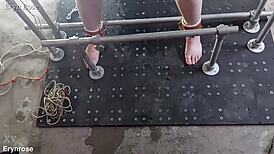 She's bound in metal, begging to cum with a huge dildo!