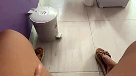 Latina student fingers huge wet pussy in public toilet flashing swollen lips to clients!