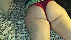 red thong with big cheeks and pussy on display