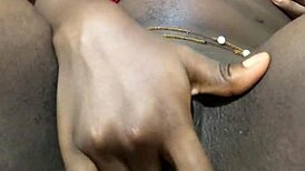 i'm an ebony babe masturbatin' my big wet pussy at home