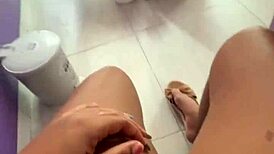 Latina student fingers huge wet pussy in public toilet flashing swollen lips to clients!