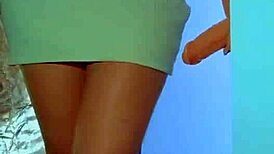 College desi girl intensely masturbates with a glass dildo, wearing a sexy dress and sneakers, reaching a powerful orgasm.