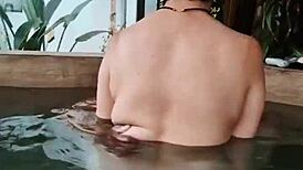 Wife comforts husband's friend in intimate moment