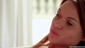 kissing and fingering beautiful erotic lesbians with strapon play