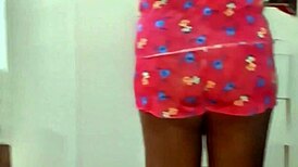 naked applying moisturizer in homemade setting