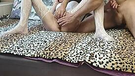 Wife in white stockings gets fucked in front of her cuckold husband