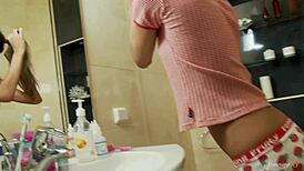 Pigtailed teen Valentina E experiences a strong reaction with a large vibrator