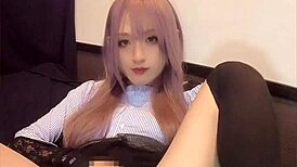 Pink-haired ladyboy masturbates with anal vibe