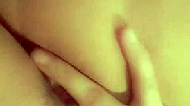 A redhead Latina explores subtle self-touch techniques