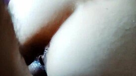 My wife enjoys stretching her body with a large object in close-up view