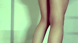 Asian ladyboy masturbates outdoors in public, cum soaking her panties under the skirt.