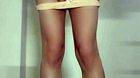 Asian ladyboy masturbates outdoors in public, cum soaking her panties under the skirt.