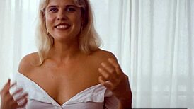 Petite Australian MILF slowly undresses to reveal her round tits and sandy bubble butt in a sensual striptease.