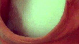 An asian teen gets filmed outdoors in high definition.