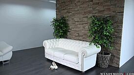 wendy moon is posing totally naked in front of a photograper