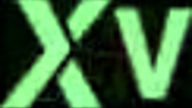 Goddess displays cute curly toes in white socks beneath jeans on spring grass field