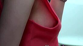 An asian teen gets filmed outdoors in high definition.