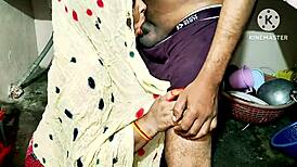 Desi Bhabhi Engages in Hardcore Fucking in the Kitchen, Sucking Monster Cock and Using Banana for Dirty Play