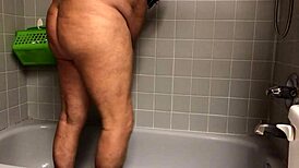 she steps into the shower for a warm, relaxing start to her day