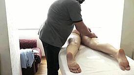 Massage parlor masseur massages ass and pussy, wife jerks cock and cums on pussy