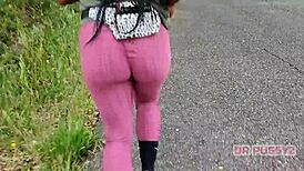 Ebony Woman with Large Butt in Leggings Running Alone in the Forest