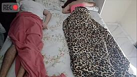 Old man lies to share bed with young visitor for taboo handjob.