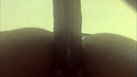 Wet ebony pussy gets fucked hard by a big dildo in solo play.