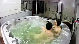 young lesbian couple takes bath and fingering in jacuzzi