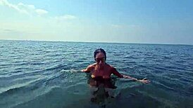 Chat On The Beach Between Voyeurs And Passers-By