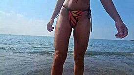 Chat On The Beach Between Voyeurs And Passers-By