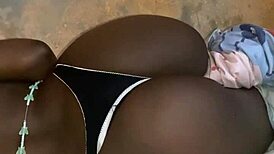 Aline Lounging on the Bed in a Cozy Setting