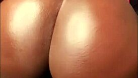 big oiled booty twerks teasingly with and without thong