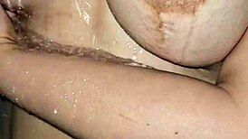 Mature Woman Enjoys A Relaxing Shower Session In Part One