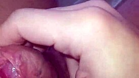 Detailed solo masturbation showcasing massive pierced cock with multiple holes