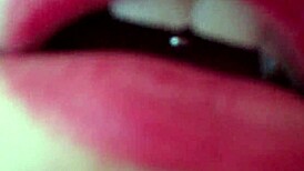 young brunette using a big pink dildo