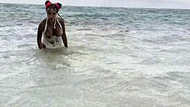 Monika Fox swims in the sea, fucks her pussy with a big dildo on the white sand beach!