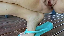 horny mature squats gapes cunt outdoors on deck