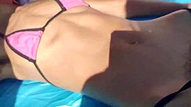 Skinny Latina teases flashing hairy pussy and small tits barefoot on public beach