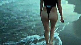 blonde teases with tits then drops for public beach cock suck