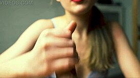 Watch her red lips stroke boyfriend's cock close-up till he explodes in moans!