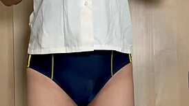 Japanese swim club girl in swimsuit gets anal trained with buttplug and spanking