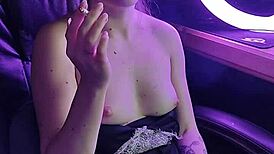 A Beautiful Lady Smokes a Cigarette Gracefully and Seductively