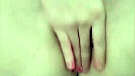 Novinha Ayumi rubs her pussy while smoking casually at home