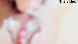 bound babe teases clit to squirting orgasm in bondage play