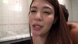 Busty Japanese Milf Soaks Huge Tits in Bath