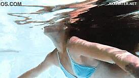 Lana the skinny Hungarian swims poolside showing juicy tits ass