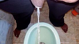boy pees while black man watches intense urination scene